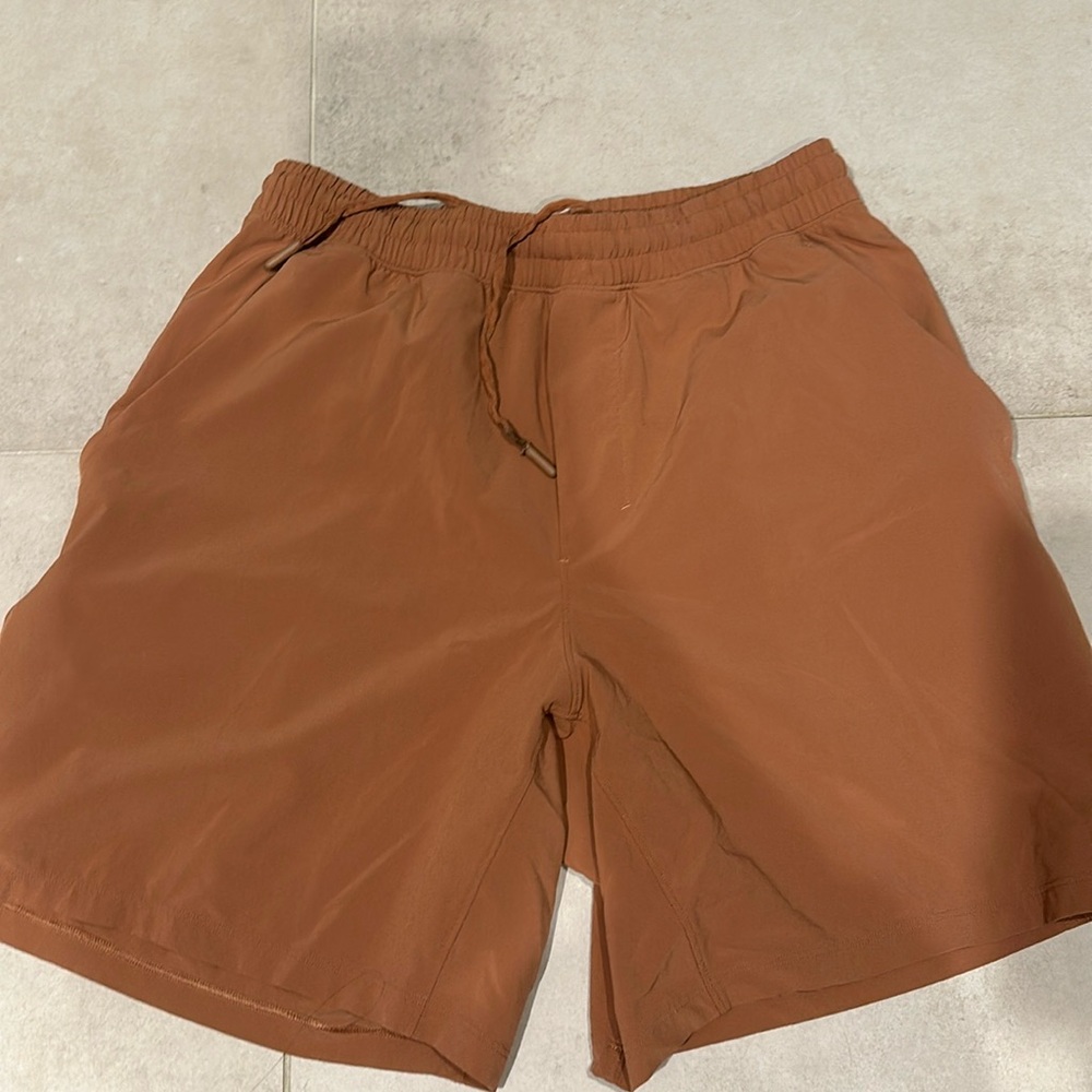 Lululemon linerless shorts orange medium